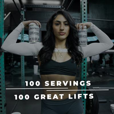Woman holding two containers of a supplement with text '100 Servings 100 Great Lifts' in a gym setting.